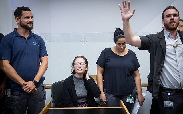 Lara Alqasem, sitting, at Tel Aviv District court on October 11, 2018. (Miriam Alster/Flash90) Lara Alqasem, sitting, at Tel Aviv District court on October 11, 2018. (Miriam Alster/Flash90)
