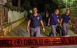 Security forces at the scene where a woman was murdered by her husband at their home in Netanya, October 14, 2018. (Flash90)