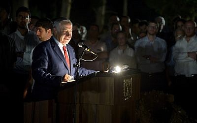 Prime Minister Benjamin Netanyahu speaks during the funeral of prominent defense attorney Yaakov Weinroth, in Netanya. October 16, 2018. (Flash90) Prime Minister Benjamin Netanyahu speaks during the funeral of prominent defense attorney Yaakov Weinroth, in Netanya. October 16, 2018. (Flash90)