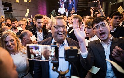 Supporters celebrate as Jerusalem mayoral candidate Moshe Lion arrives at his campaign headquarters , on October 30, 2018. (Hadas Parush/Flash90)