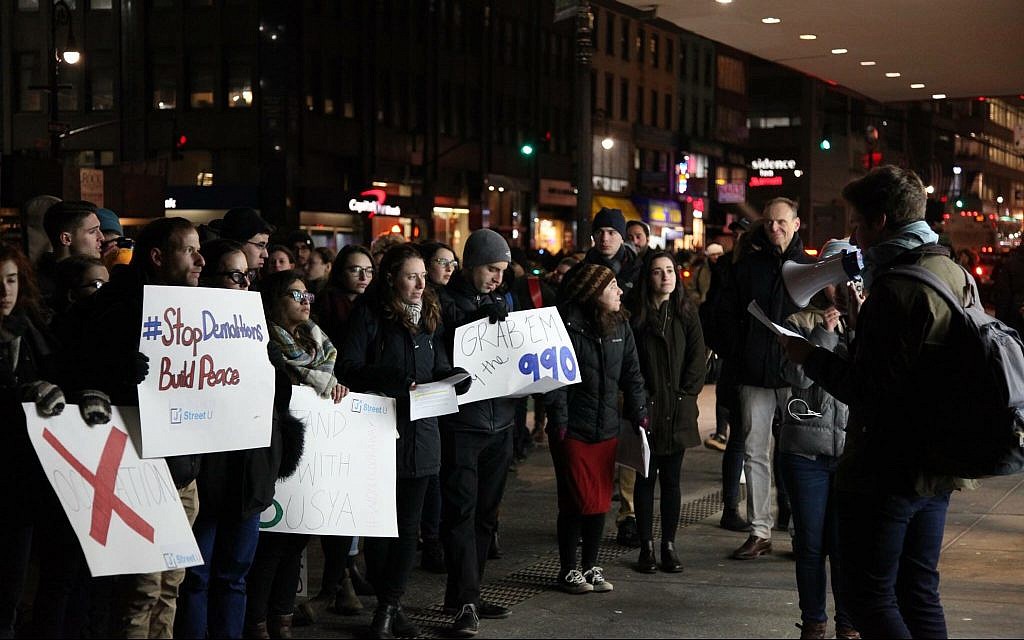 A teach-in co-led by Matan Arad-Neeman in February 2017, outside the offices of the Central Fund of Israel due to their funding of Regavim, which is pushing for the demolition of several Palestinian communities in Area C. (Courtesy)