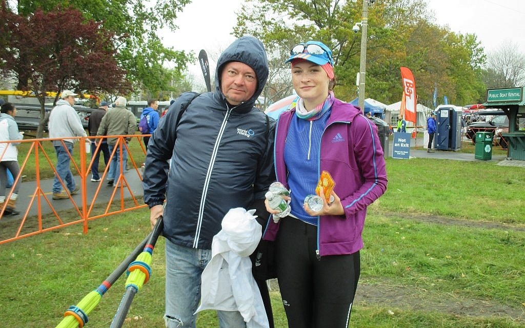 Michal Spalter, with coach Robert Nuckowski, minutes after she stepped
out of her racing shell, on Sunday, October 21, at the Head  of the Charles Regatta. (Penny Schwartz/ Times of Israel)