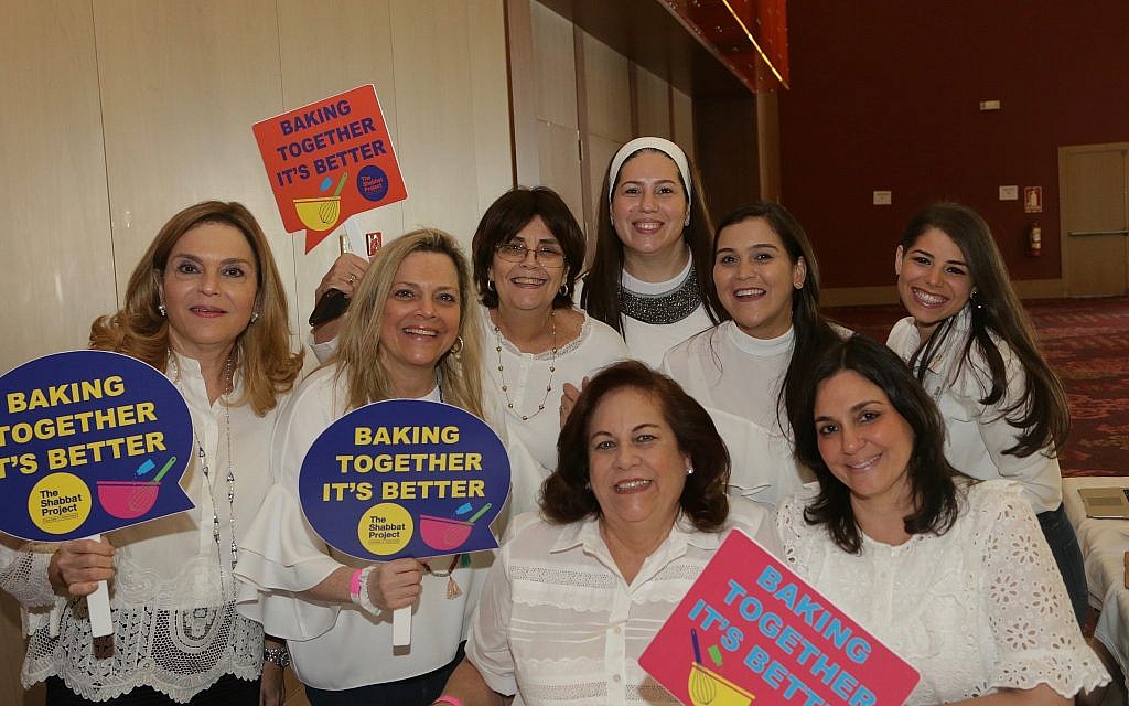 Ahead of this year's Shabbat Project, women from Panama's Jewish community tout the Pink Challah Bake. (Courtesy)