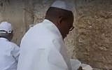 A video said to have been shot on October, 19, 2018, purportedly shows Nigerian separatist leader Nnamdi Kanu praying at the Western Wall in Jerusalem's Old City. (Screen capture: Twitter)