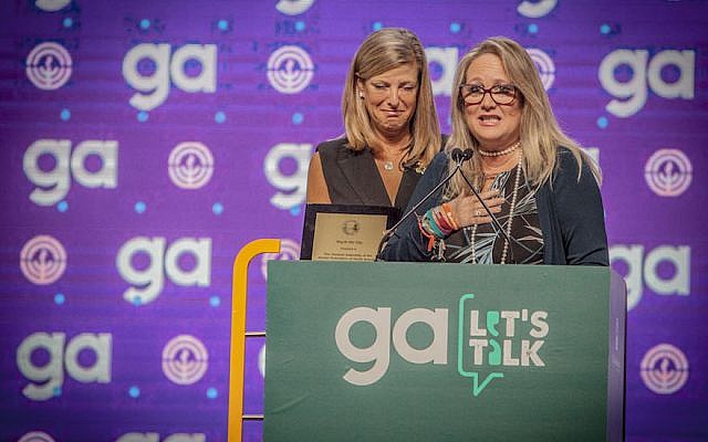 Stacy Kagan, right, vice mayor of Parkland, Florida, addresses the General Assembly of the Jewish Federations of North America in Tel Aviv, October 23, 2018. (JFNA) Stacy Kagan, right, vice mayor of Parkland, Florida, addresses the General Assembly of the Jewish Federations of North America in Tel Aviv, October 23, 2018. (JFNA)