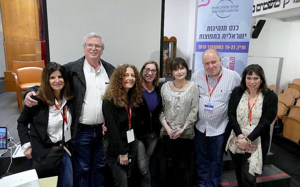 Global Israeli Leadership (GIL) board members pose for photo with visiting author from Israel, Mira Magen, (3rd from right) who spoke at the conference Sunday, October 21, 2018. (Doug Dalgleish)