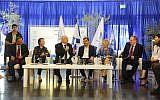 President Rivlin (seated, third left) at the inauguration of the program in Jerusalem to boost Arab and, Haredim in the Israeli tech sector. (Yanai-Rubaja)