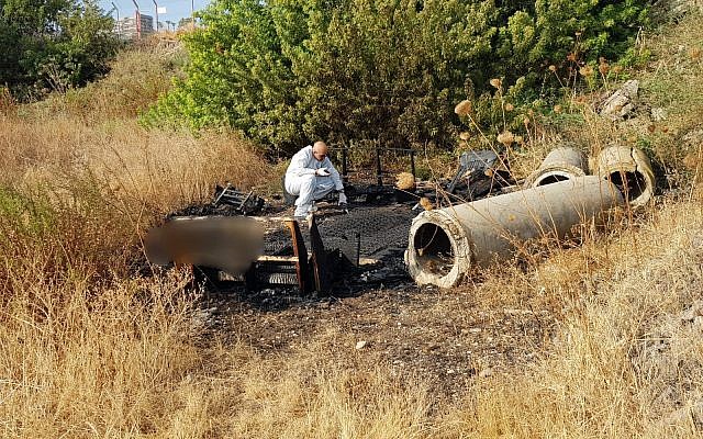 Police at the scene of a bush fire in Tiberias where a body was found, October 8, 2018. (Israel Police) Police at the scene of a bush fire in Tiberias where a body was found, October 8, 2018. (Israel Police)