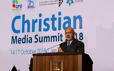Prime Minister Benjamin Netanyahu addresses the Christian Media Summit in Jerusalem, October 14, 2018. (Haim Tzach/GPO)