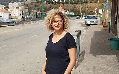 Sameera Rada Emran, a candidate for mayor in Ein Qinya, stands outside home on October 23, 2018. (Adam Rasgon/Times of Israel)