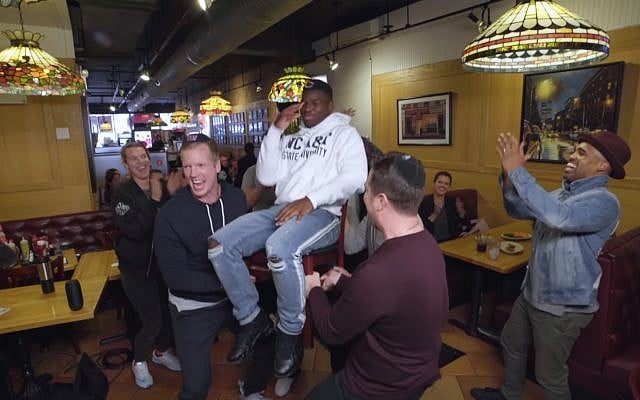 Tarik Cohen tries Jewish food (YouTube Screenshot) Tarik Cohen tries Jewish food (YouTube Screenshot)