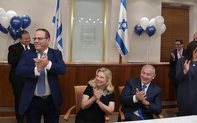 Prime Minister Benjamin Netanyahu at a birthday celebration at his office in Jerusalem on October 24, 2018. (Amos Ben Gershon/GPO) Prime Minister Benjamin Netanyahu at a birthday celebration at his office in Jerusalem on October 24, 2018. (Amos Ben Gershon/GPO)