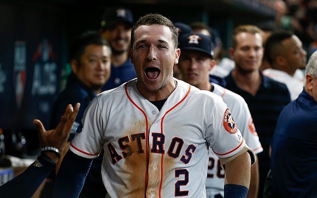 American Jewish baseball player Alex Bregman reacts in the dugout after hitting a home run in the second game of the American League Division Series against the Cleveland Indians at Minute Maid Park in Houston, October 6, 2018. (Bob Levey/Getty Images/via JTA) American Jewish baseball player Alex Bregman reacts in the dugout after hitting a home run in the second game of the American League Division Series against the Cleveland Indians at Minute Maid Park in Houston, October 6, 2018. (Bob Levey/Getty Images/via JTA)
