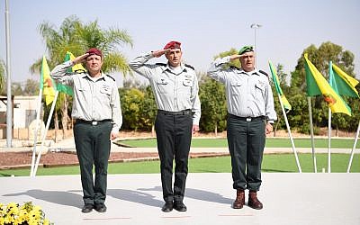 Brig. Gen. Yehuda Fuchs, right, Maj. Gen. Herzi Halevi, the head of the IDF Southern Command, center, and Brig. Gen. Eliezer Toledano at a ceremony to install the latter as the new head of the IDF's Gaza Division, October 24, 2018. (IDF Spokesperson)