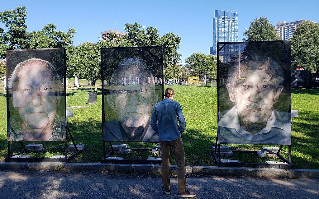 Portraits of Holocaust survivors on Boston Common for the 'Lest We Forget' remembrance installation, Boston, Massachusetts, October 16, 2018 (Matt Lebovic/The Times of Israel)
