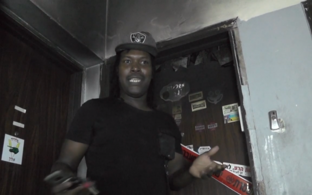 Faiz Varoispa, an asylum seeker from Sudan who ran into a burning south Tel Aviv building to rescue his neighbor on October 12, 2018 (Screenshot via Ynet) Faiz Varoispa, an asylum seeker from Sudan who ran into a burning south Tel Aviv building to rescue his neighbor on October 12, 2018 (Screenshot via Ynet)