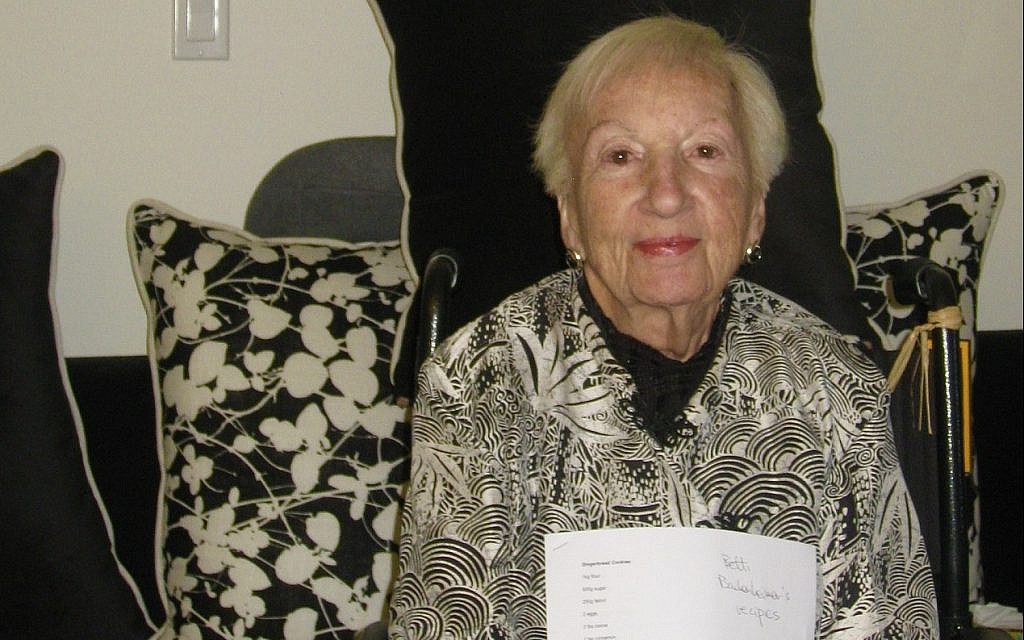 Bunny North, née Brunhilde Bachenheimer, holding the translated recipes. (Courtesy)
