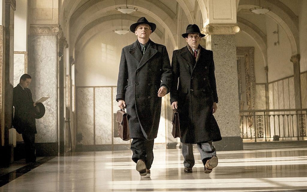 Barry Atsma, left, and Jacob Derwig portray Walraven and Gijs van Hall respectively in 'The Resistance Banker.' (Dutch FilmWorks/via JTA) Barry Atsma, left, and Jacob Derwig portray Walraven and Gijs van Hall respectively in 'The Resistance Banker.' (Dutch FilmWorks/via JTA)
