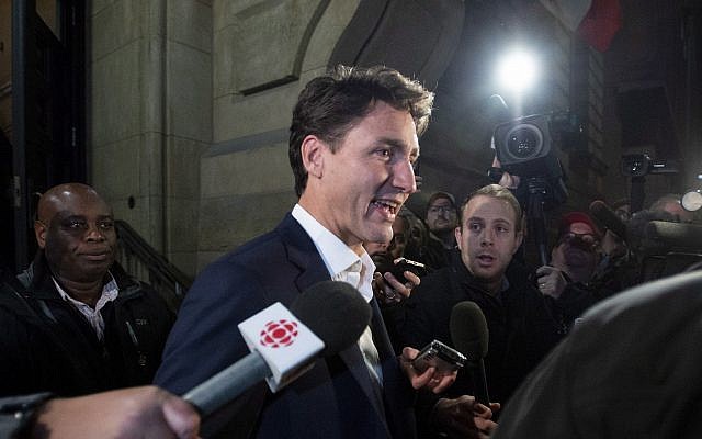 Prime Minister Justin Trudeau leaves the Office of the Prime Minister and Privy Council after an agreement was reached in the NAFTA negotiations in Ottawa, Ontario, September 30, 2018. (Justin Tang/The Canadian Press via AP) Prime Minister Justin Trudeau leaves the Office of the Prime Minister and Privy Council after an agreement was reached in the NAFTA negotiations in Ottawa, Ontario, September 30, 2018. (Justin Tang/The Canadian Press via AP)
