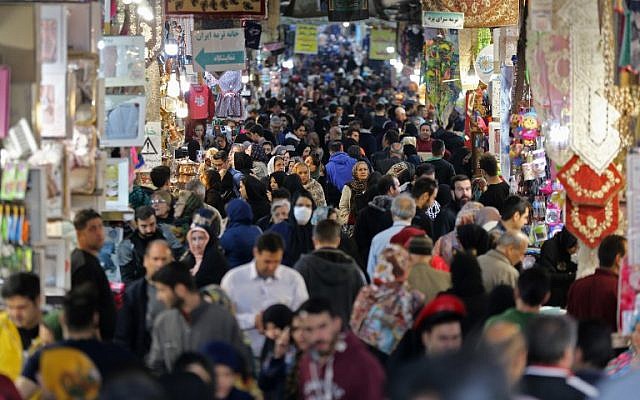 Illustrative: Iranians shop in the capital Tehran's grand bazar on November 3, 2018. (ATTA KENARE / AFP) Illustrative: Iranians shop in the capital Tehran's grand bazar on November 3, 2018. (ATTA KENARE / AFP)