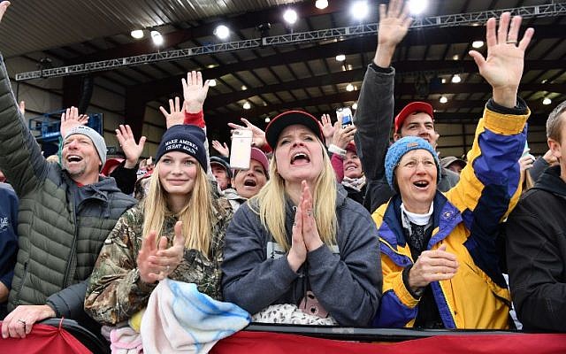 Supporters cheer as US President Donald Trump addresses a "Make America Great Again" rally at Bozeman Yellowstone International Airport, on November 3, 2018 in Belgrade, Montana. (Nicholas Kamm / AFP) Supporters cheer as US President Donald Trump addresses a "Make America Great Again" rally at Bozeman Yellowstone International Airport, on November 3, 2018 in Belgrade, Montana. (Nicholas Kamm / AFP)