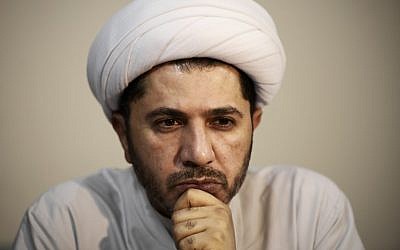 In this file photo taken on November 20, 2014, Bahrain's Al-Wefaq opposition group leader Sheikh Ali Salman looks on during a rally against the upcoming parliamentary election in the village of Zinj, south of Manama, Bahrain. (Mohammed Al-Shaikh/AFP)