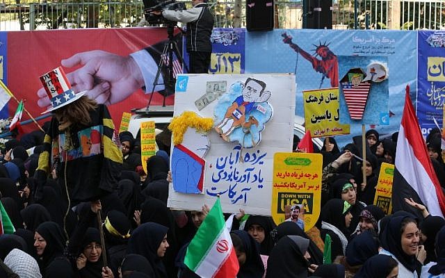 Iranian protesters demonstrate outside the former US Embassy in the Iranian capital Tehran on November 4, 2018, marking the anniversary of its storming by student protesters that triggered a hostage crisis in 1979. (ATTA KENARE/AFP) Iranian protesters demonstrate outside the former US Embassy in the Iranian capital Tehran on November 4, 2018, marking the anniversary of its storming by student protesters that triggered a hostage crisis in 1979. (ATTA KENARE/AFP)