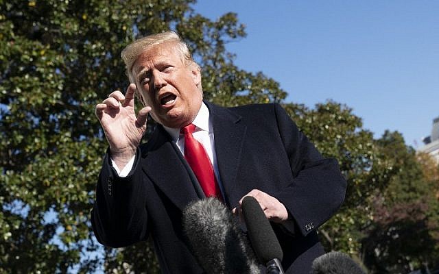 US President Donald Trump speaks to the media as he departs the White House in Washington, DC, to attend political events in Georgia and Tennessee, November 4, 2018. (CHRIS KLEPONIS / AFP) US President Donald Trump speaks to the media as he departs the White House in Washington, DC, to attend political events in Georgia and Tennessee, November 4, 2018. (CHRIS KLEPONIS / AFP)