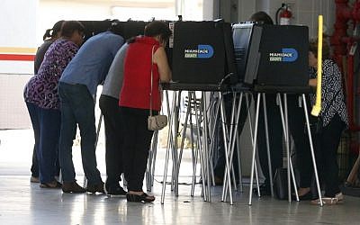South Florida voters cast their ballots at a polling center in Miami, Florida on November 6, 2018. (RHONA WISE / AFP)