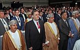 Transportation Minister Israel Katz, second left, stands next to Omani officials during the opening ceremony of the International Road Transport Union World Congress in Muscat, Oman, on November 7, 2018. (Mohammed Mahjoub/AFP)