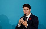 Canadian Prime Minister Justin Trudeau delivers a speech at the the Paris Peace Forum at the Villette Conference Hall in Paris on November 11, 2018. (Yoan Valat/AFP)