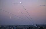 Illustrative. A picture taken from the Gaza Strip on November 12, 2018, shows missiles being launched toward Israel. (Said Khatib/AFP)