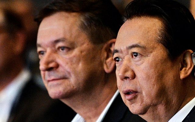 In this file photo taken on July 04, 2017 Interpol vice president Alexander Prokopchuk (L) and and Meng Hongwei, president of Interpol, attend the opening of the Interpol World Congress in Singapore on July 4, 2017. (ROSLAN RAHMAN / AFP) In this file photo taken on July 04, 2017 Interpol vice president Alexander Prokopchuk (L) and and Meng Hongwei, president of Interpol, attend the opening of the Interpol World Congress in Singapore on July 4, 2017. (ROSLAN RAHMAN / AFP)