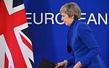 Britain's Prime Minister Theresa May leaves after a press conference following a special meeting of the European Council to endorse the draft Brexit withdrawal agreement on November 25, 2018 in Brussels. (Emmanuel Dunand/AFP)
