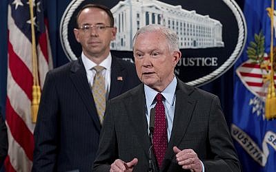 In this photo from July 20, 2017, Attorney General Jeff Sessions accompanied by Deputy Attorney General Rod Rosenstein, speaks at a news conference at the Justice Department in Washington. (AP Photo/Andrew Harnik)