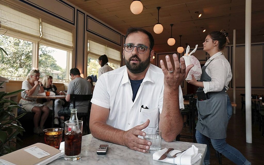 Alon Shaya speaks during an interview with the Associated Press at his restaurant Saba in New Orleans,  August 23, 2018. (Gerald Herbert/AP)