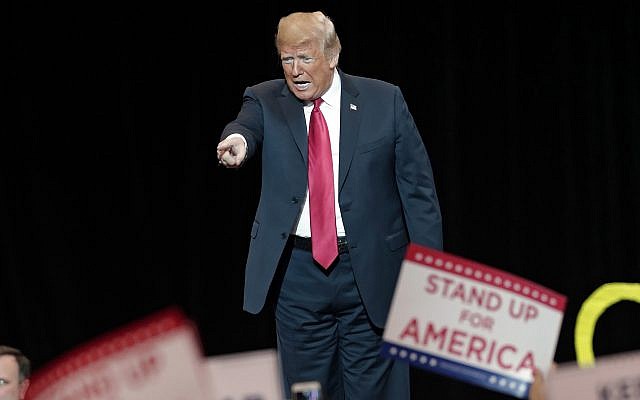 US President Donald Trump acknowledges supporters before speaking at a campaign rally, Monday, November 5, 2018, in Cleveland. (AP Photo/Tony Dejak) US President Donald Trump acknowledges supporters before speaking at a campaign rally, Monday, November 5, 2018, in Cleveland. (AP Photo/Tony Dejak)