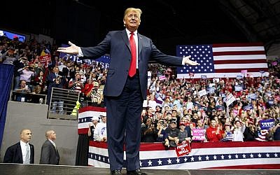 US President Donald Trump arrives for a rally at Allen County War Memorial Coliseum, November 5, 2018, in Fort Wayne, Ind. (AP Photo/Carolyn Kaster)