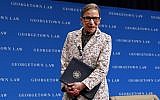 In this photo from September 26, 2018, US Supreme Court Justice Ruth Bader Ginsburg leaves the stage after speaking to first-year students at Georgetown Law in Washington. (AP Photo/Jacquelyn Martin, File)