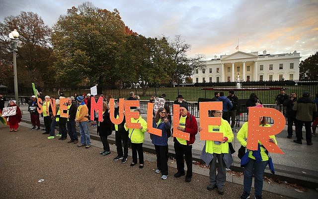 Protesters gather in front of the White House in Washington, Thursday, November 8, 2018, as part of a nationwide "Protect Mueller" campaign demanding that acting US Attorney General Matthew Whitaker recuse himself from overseeing the ongoing special counsel investigation. (AP Photo/Manuel Balce Ceneta) Protesters gather in front of the White House in Washington, Thursday, November 8, 2018, as part of a nationwide "Protect Mueller" campaign demanding that acting US Attorney General Matthew Whitaker recuse himself from overseeing the ongoing special counsel investigation. (AP Photo/Manuel Balce Ceneta)