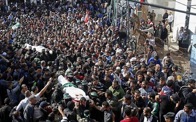 Palestinian mourners carry the bodies of two of the seven Hamas jihadists who were killed in an Israeli raid, during their funerals in Khan Younis, southern Gaza Strip, November 12, 2018. (AP Photo/Adel Hana) Palestinian mourners carry the bodies of two of the seven Hamas jihadists who were killed in an Israeli raid, during their funerals in Khan Younis, southern Gaza Strip, November 12, 2018. (AP Photo/Adel Hana)