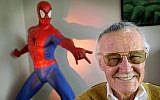 Stan Lee, creator of comic-book franchises such as 'Spider-Man,' 'The Incredible Hulk' and 'X-Men,' smiles during a photo session in his office in Santa Monica, California, April 16, 2002.  (Reed Saxon/AP)