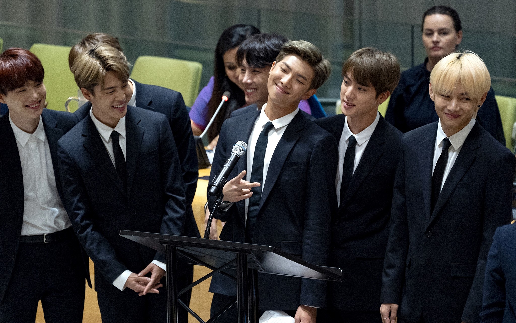 K-Pop band BTS apologizes for member's A-bomb shirt, Nazi