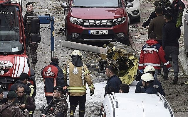 The debris of a military helicopter that crashed with five soldiers on board is seen in a neighborhood of Istanbul, Turkey, November 26, 2018. (DHA via AP) The debris of a military helicopter that crashed with five soldiers on board is seen in a neighborhood of Istanbul, Turkey, November 26, 2018. (DHA via AP)