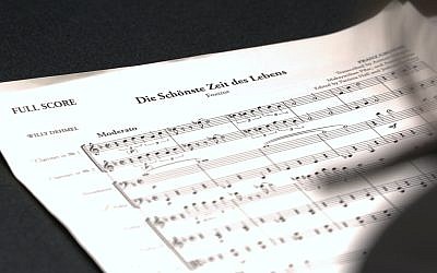 This Nov. 7, 2018, photo provided by the University of Michigan shows the full score for "The Most Beautiful Time of Life (Die Schönste Zeit des Lebens)" at the Duderstadt Center recording studio on campus in Ann Arbor, Michigan (Christopher Boyes/University of Michigan via AP)