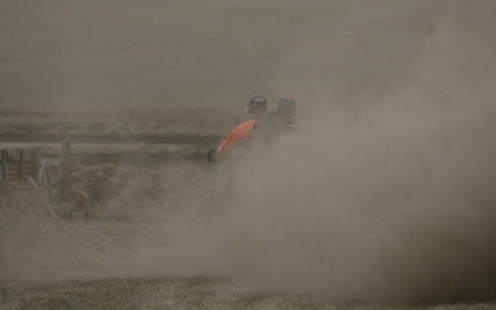 Farmers check on their animals near Kirkjubaearklaustur 260 km (162 miles) from Reykjavík, Iceland Tuesday May 24, 2011, after the Grimsvotn volcano began erupting on Saturday, sending clouds of ash high into the air that have then been carried toward the European continent on the wind. (AP Photo/Brynjar Gauti )