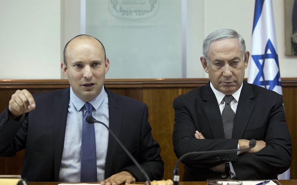 Prime Minister Benjamin Netanyahu, right, and then-Education Minister Naftali Bennett, left, attend the weekly cabinet meeting at the Prime Minister's Office in Jerusalem, Tuesday, August 30, 2016. (Abir Sultan/Pool/via AP) Prime Minister Benjamin Netanyahu, right, and then-Education Minister Naftali Bennett, left, attend the weekly cabinet meeting at the Prime Minister's Office in Jerusalem, Tuesday, August 30, 2016. (Abir Sultan/Pool/via AP)