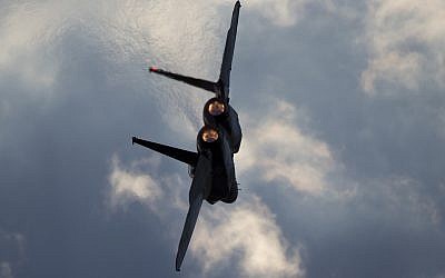 This December 29, 2016 photo shows an Israeli Air Force F-15 plane in flight during a graduation ceremony for new pilots in the Hatzerim air force base near the city of Beersheba. (AP/Ariel Schalit)