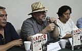 In this picture taken March 22, 2017, journalist Javier Valdez speaks during the presentation of his latest book, in Acapulco, Mexico. (AP Photo/Bernandino Hernandez)