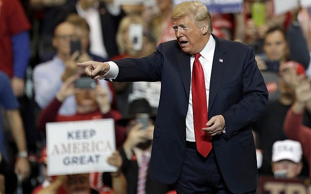 US President Donald Trump looks to the cheering crowd as he arrives to speak at a rally at Allen County War Memorial Coliseum, November 5, 2018, in Fort Wayne, Indiana (AP Photo/Carolyn Kaster) US President Donald Trump looks to the cheering crowd as he arrives to speak at a rally at Allen County War Memorial Coliseum, November 5, 2018, in Fort Wayne, Indiana (AP Photo/Carolyn Kaster)